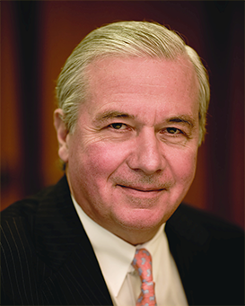 Jean-Paul-Montupet3_ Jean-Paul Montupet, Assurant Board Member, dressed in a suit and tie and looking at the camera