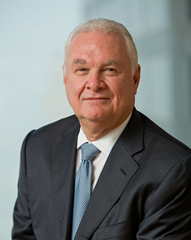 Juan N. Centro Juan N. Centro, Assurant Board Member, dressed in a suit and tie and looking at the camera