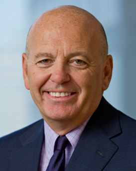 Paull J Reilly Paul J Reilly, Assurant Board Member, dressed in a suit and tie and looking at the camera