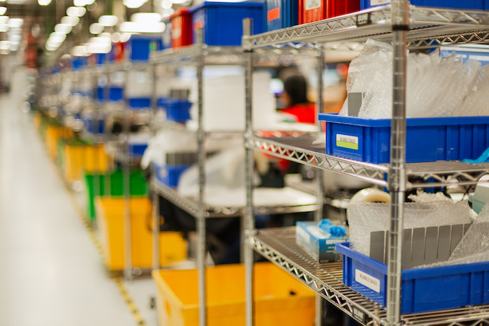 Image of stacked boxes in a mobile device center