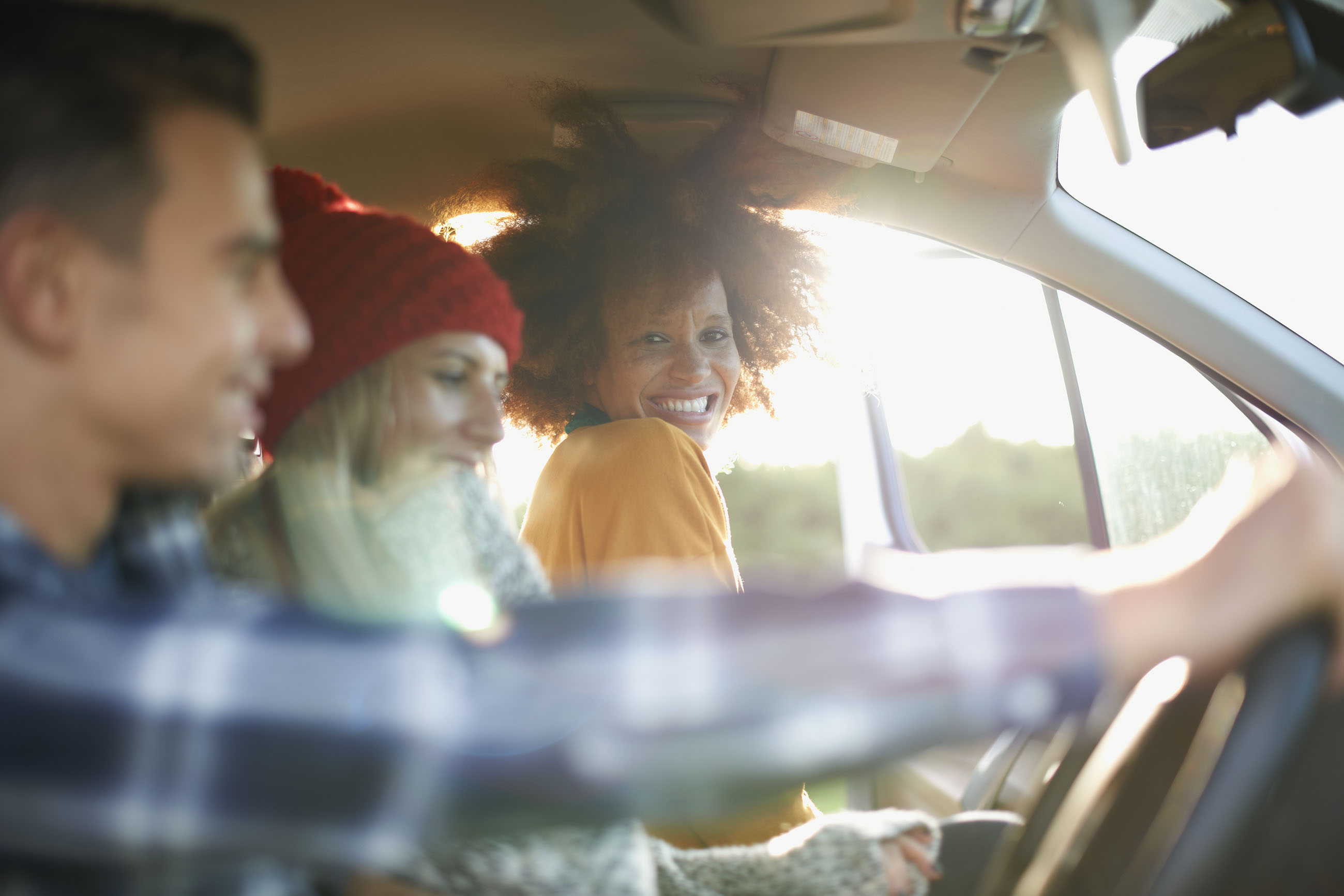 CPO1 Friends driving in a car laughing