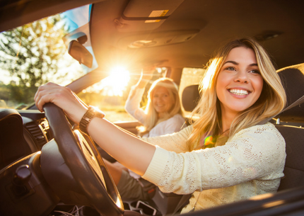 smiling woman driver with mom